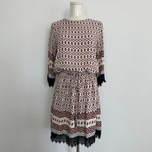 Printed dress with crochet detailing and tie waist